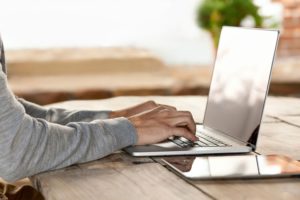 Typing on Laptop