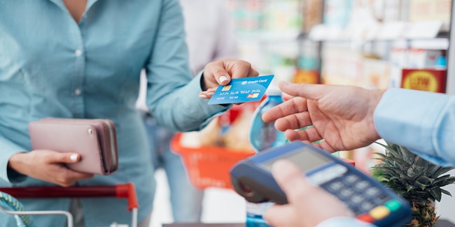 Credit Card, Woman at the store checkout
